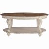 Two Tone Oval Cocktail Table with Bottom Shelf, Antique White and Brown
