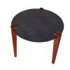 24 Inch Artisanal Round End Side Table, Aluminum Top, Tapered Acacia Wood Legs, Black, Warm Brown
